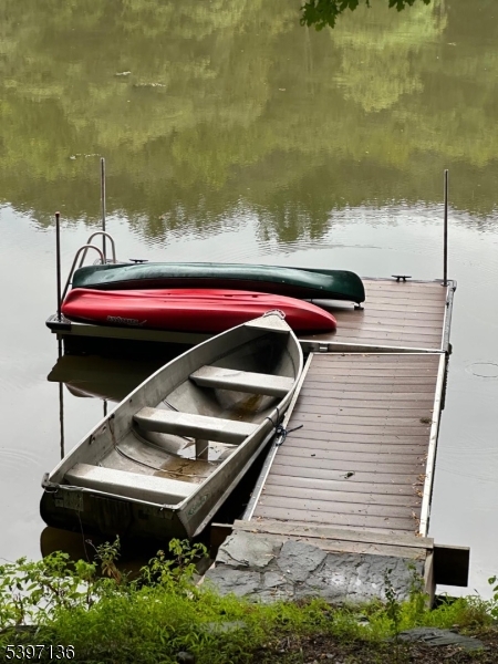 916 East End Road Newton, NJ 07860 - Photo 30 of 31 a backyard of a house with wooden deck and lake view