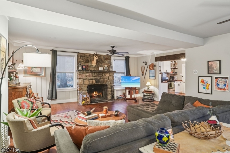 916 East End Road Newton, NJ 07860 - Photo 4 of 31 a living room with furniture and a fireplace