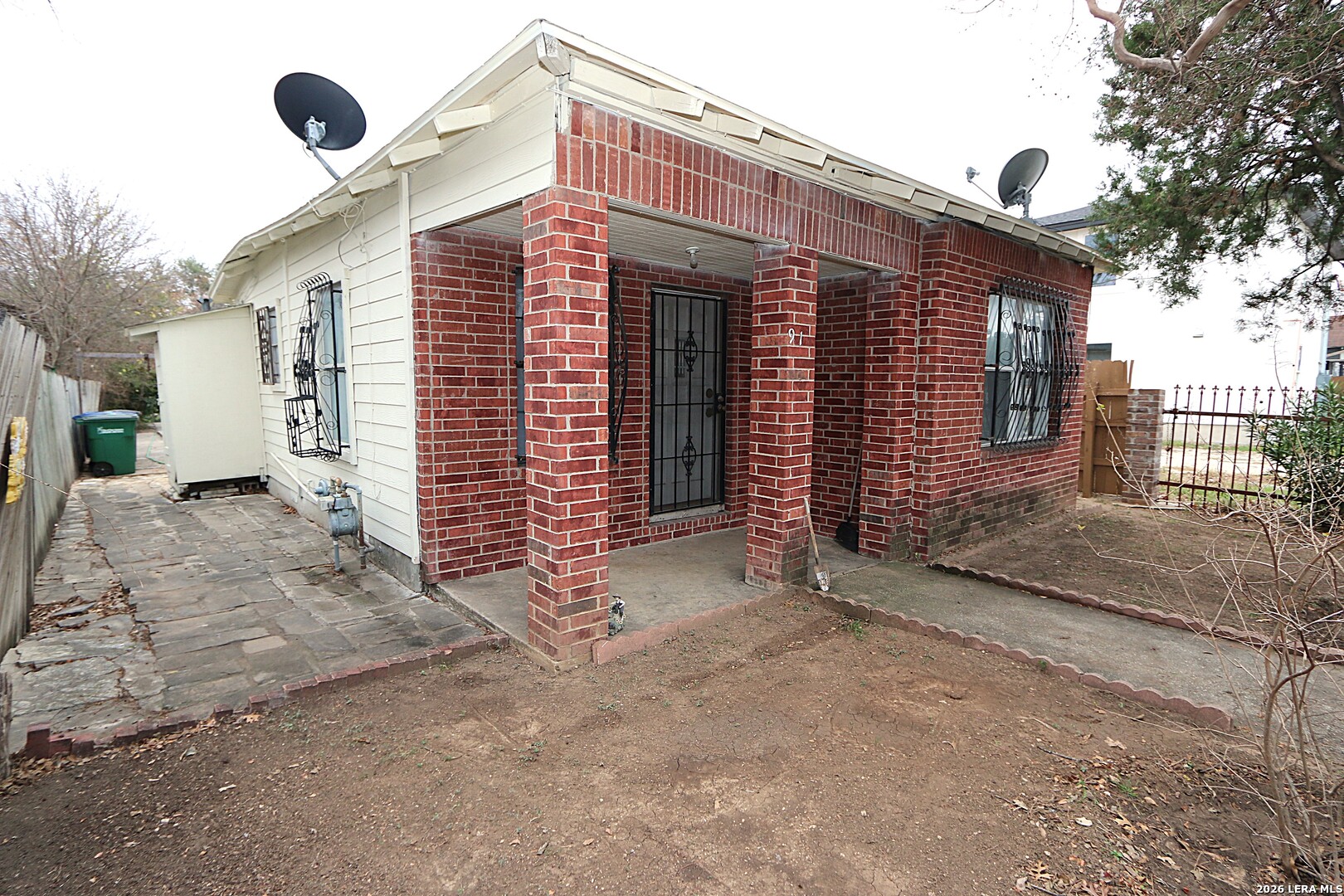 910 Culebra Road San Antonio, TX 78201 - Photo 2 of 33 a front view of a house with parking space