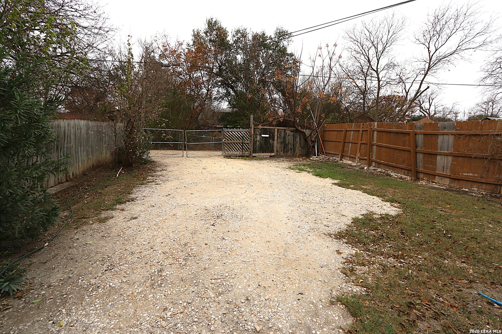 910 Culebra Road San Antonio, TX 78201 - Photo 28 of 33 a view of backyard with wooden fence