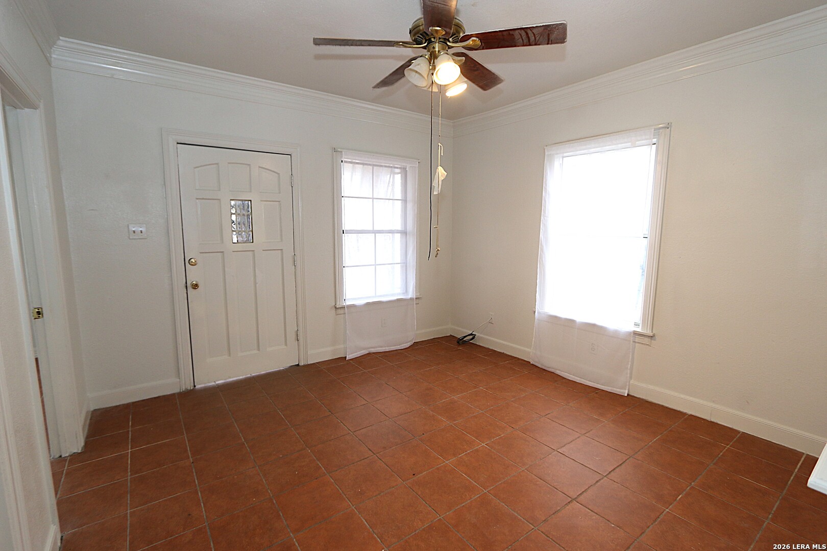 910 Culebra Road San Antonio, TX 78201 - Photo 4 of 33 a view of an empty room with a window