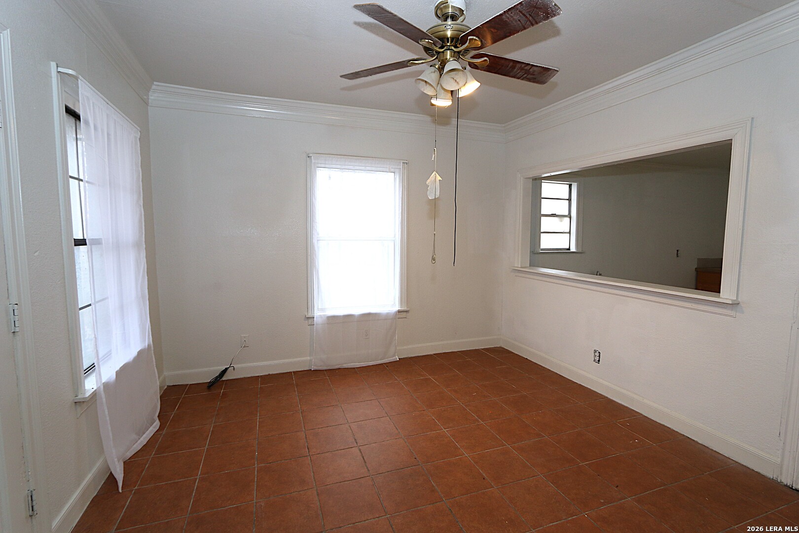 910 Culebra Road San Antonio, TX 78201 - Photo 5 of 33 a view of an empty room with a window