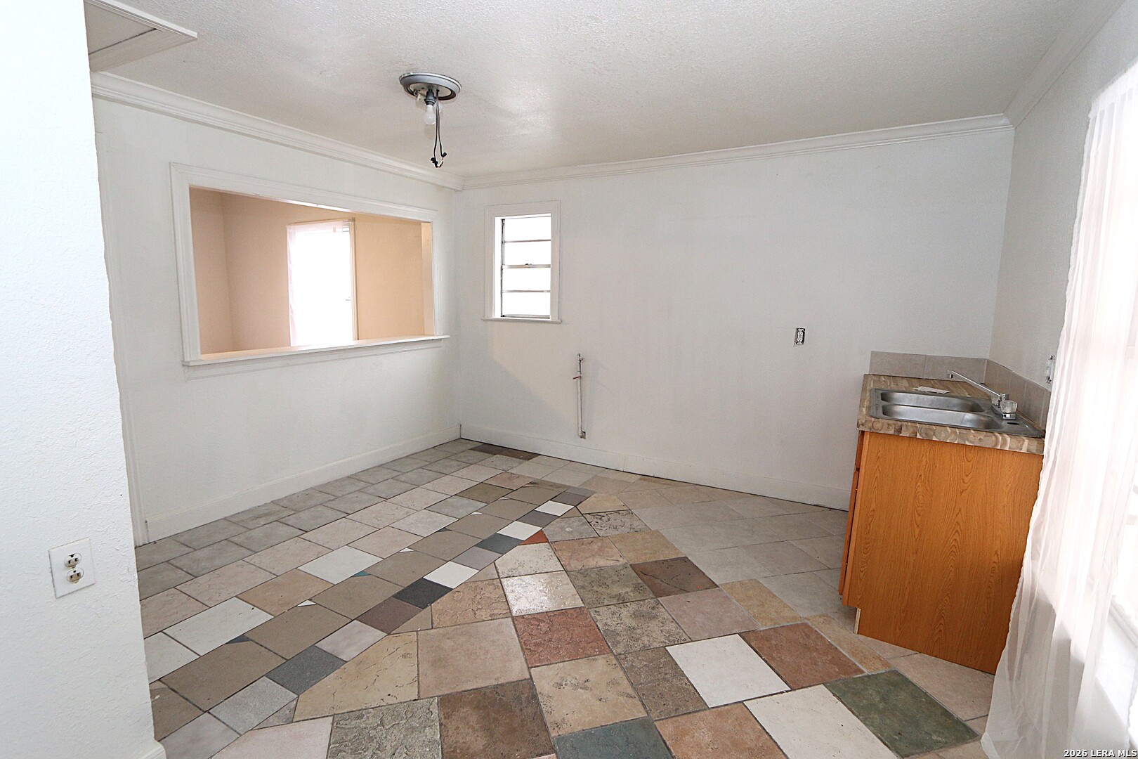 910 Culebra Road San Antonio, TX 78201 - Photo 8 of 33 a view of a room with window and hardwood floor