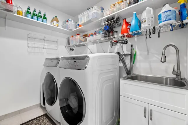 a utility room with dryer and washer