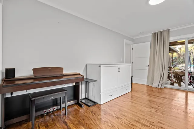 a view of workspace with wooden floor