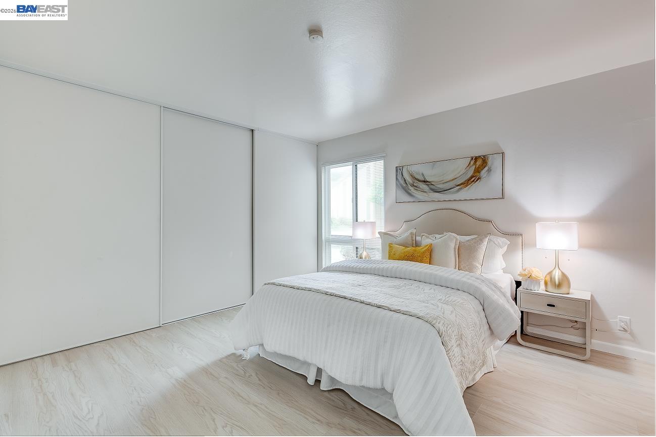 9005 Alcosta Boulevard, Unit 199 San Ramon, CA 94583 - Photo 36 of 57 a bedroom with a bed and a window
