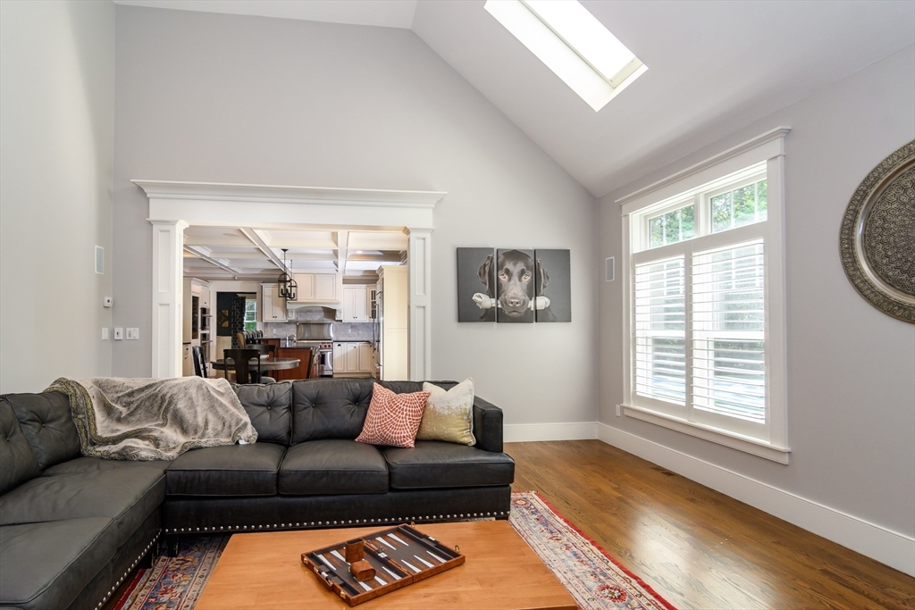 15 Hunters Lane Natick, MA 01760 - Photo 12 of 42 a living room with furniture and a window