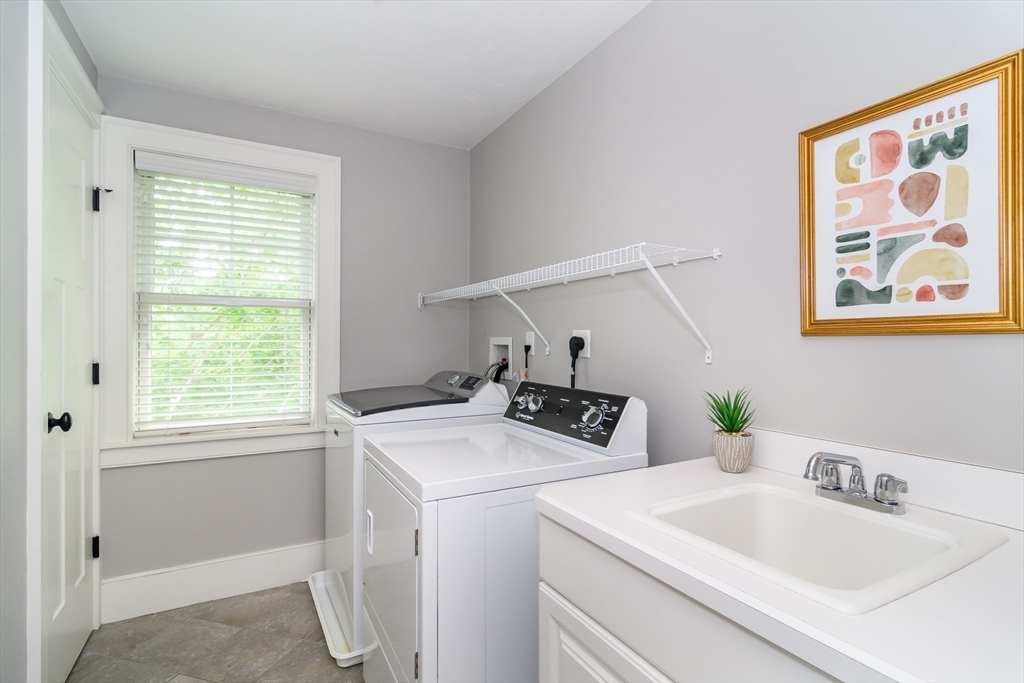 15 Hunters Lane Natick, MA 01760 - Photo 21 of 42 a utility room with dryer and washer