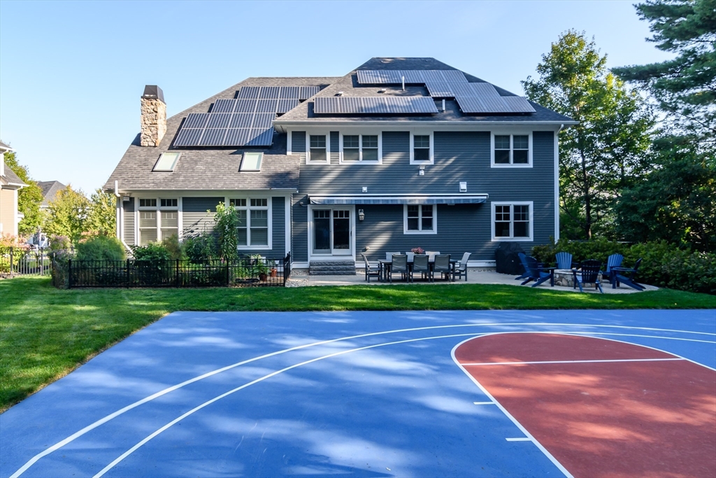 15 Hunters Lane Natick, MA 01760 - Photo 36 of 42 a front view of a house with garden