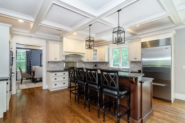 a kitchen with a table and chairs in it