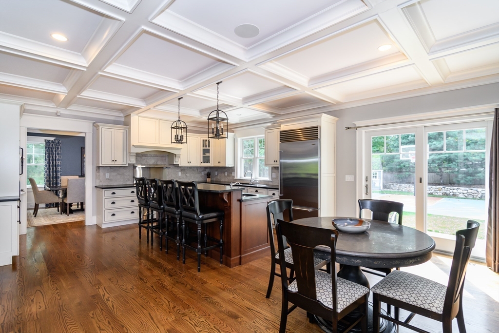 15 Hunters Lane Natick, MA 01760 - Photo 9 of 42 a dining room with furniture window and wooden floor