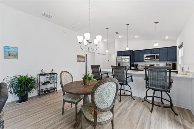a view of a living room and dining room