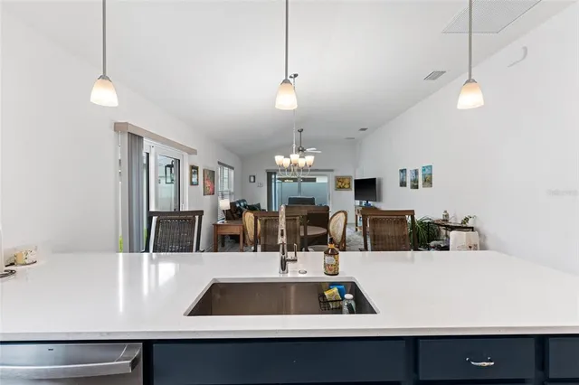 a bathroom with double vanity sinks and a mirror
