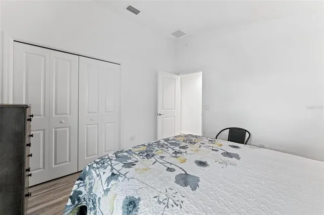 a view of a room with a mirror and a window