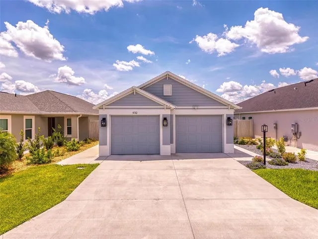 a view of a swimming pool with a lake view