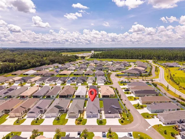 a front view of house with garage and yard