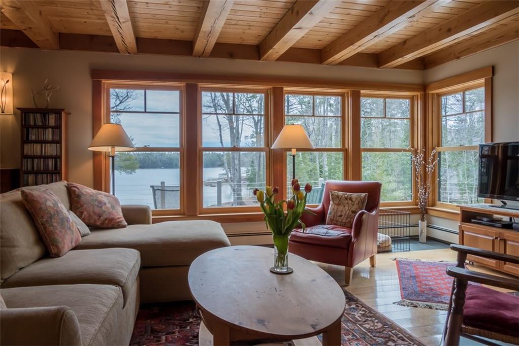 841 Mere Point Road Brunswick, ME 04011 - Photo 7 of 35 Living room with a wall of windows...