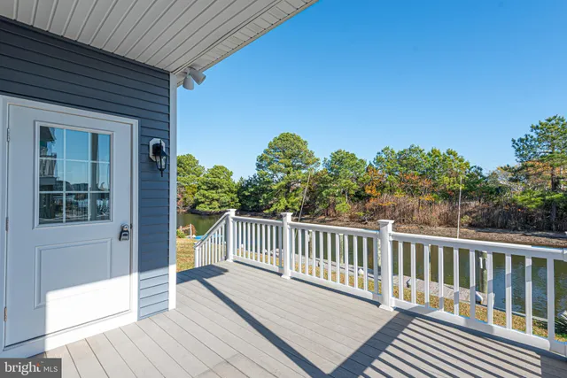 a view of a two chairs in the balcony