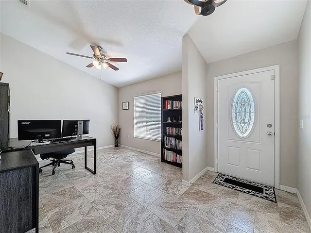 a kitchen with a stove and a table