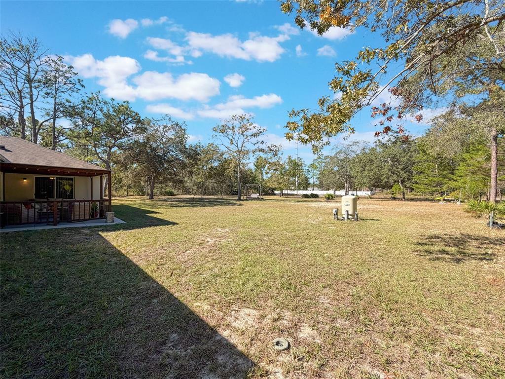 12105 Maripoe Road Weeki Wachee, FL 34614 - Photo 52 of 62 a view of outdoor space with garden