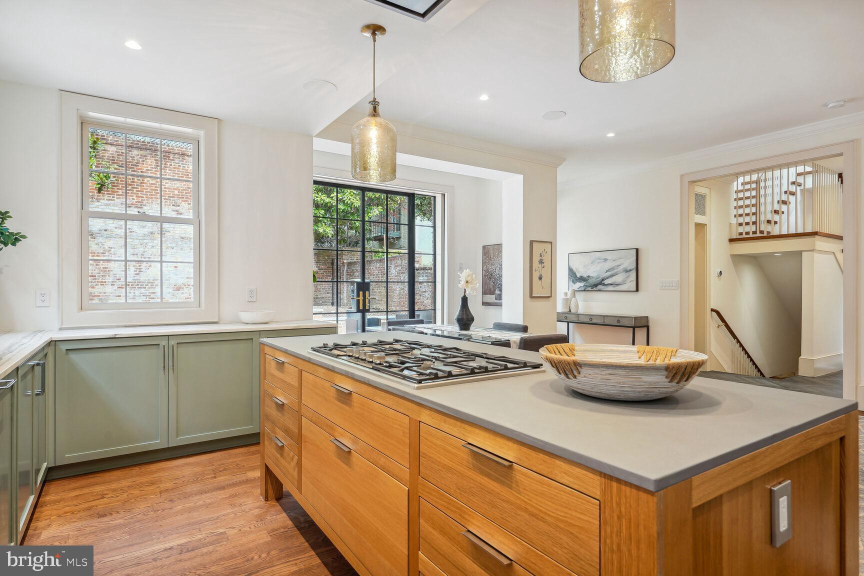 1306 27th Street Northwest Washington, DC 20007 - Photo 11 of 36 Kitchen with view of huge glass doors to patio