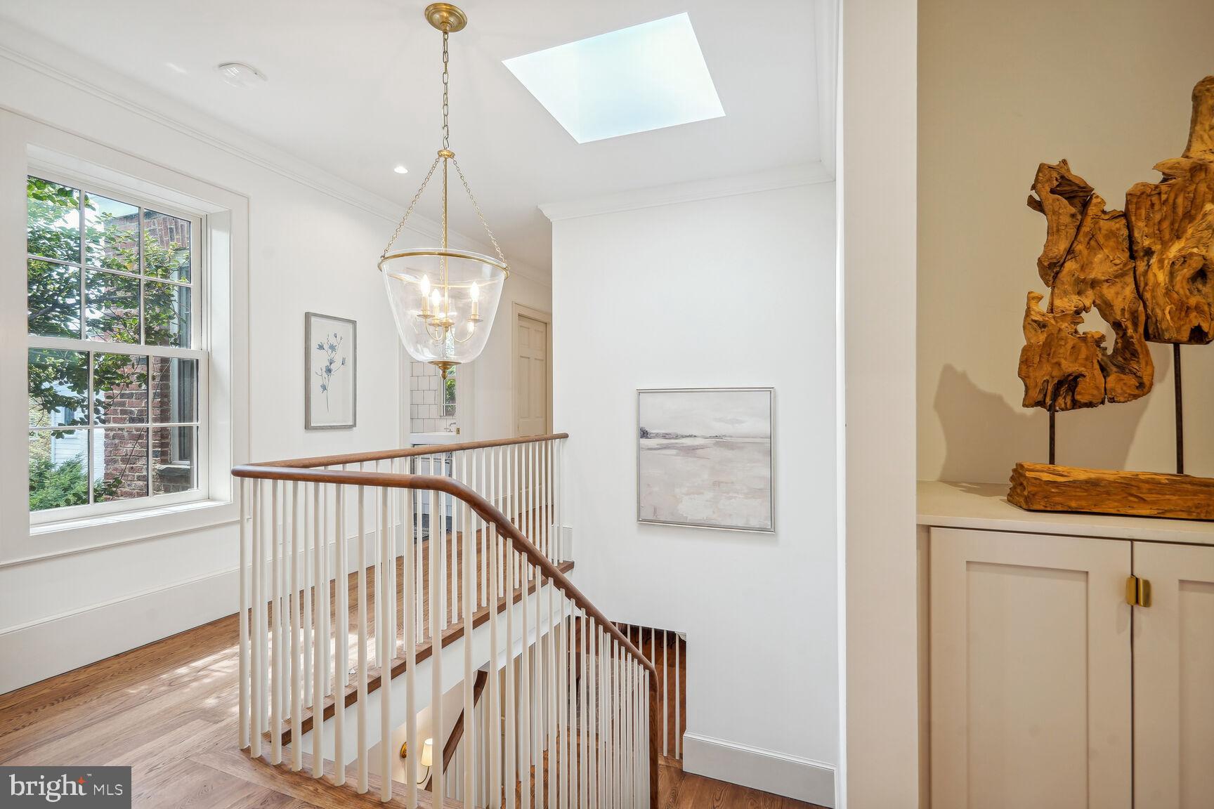 1306 27th Street Northwest Washington, DC 20007 - Photo 14 of 36 2nd level hall and beautifully crafted balustrade