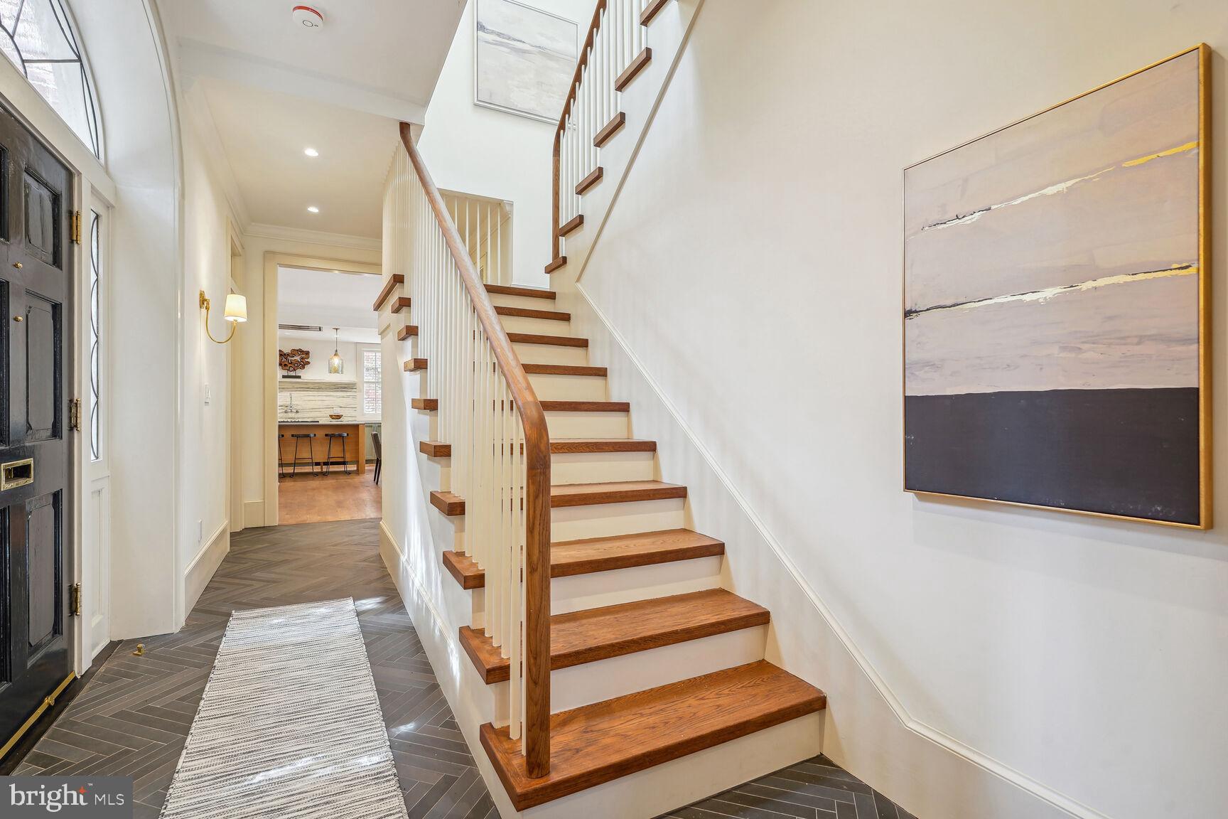 1306 27th Street Northwest Washington, DC 20007 - Photo 3 of 36 Stunning entry hallway and stairwell to 2nd level