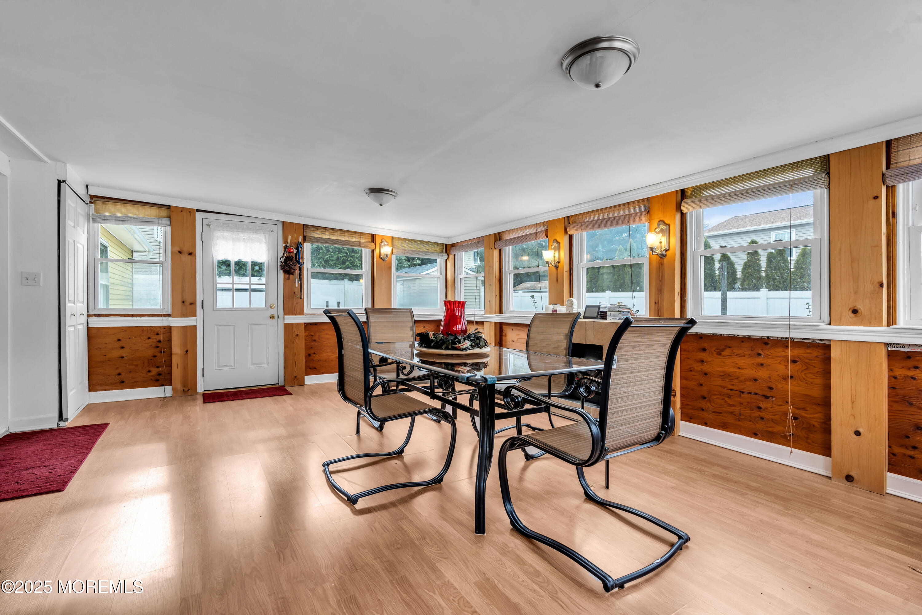 4 Evergreen Place Howell, NJ 07731 - Photo 24 of 27 a view of a dining room with furniture large windows and wooden floor