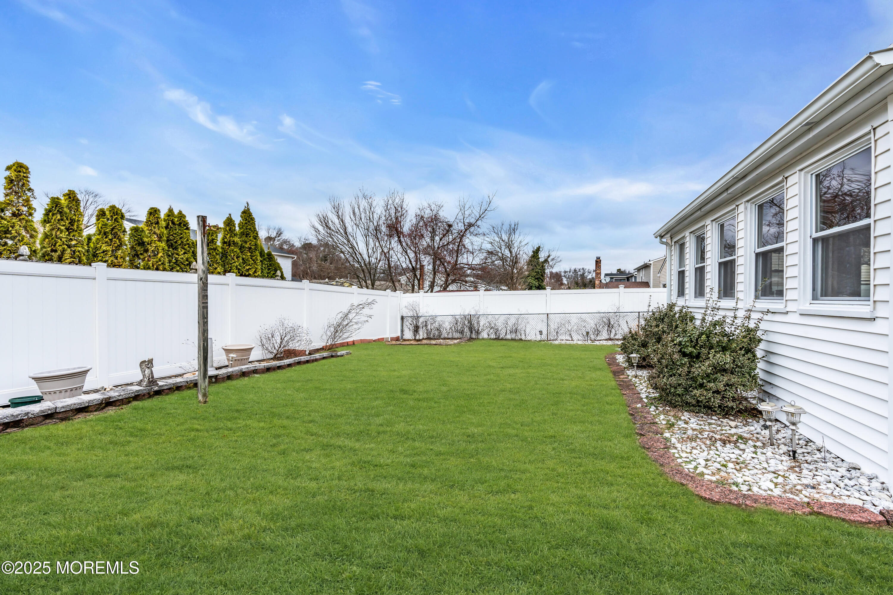 4 Evergreen Place Howell, NJ 07731 - Photo 25 of 27 a view of yard with swimming pool and green space