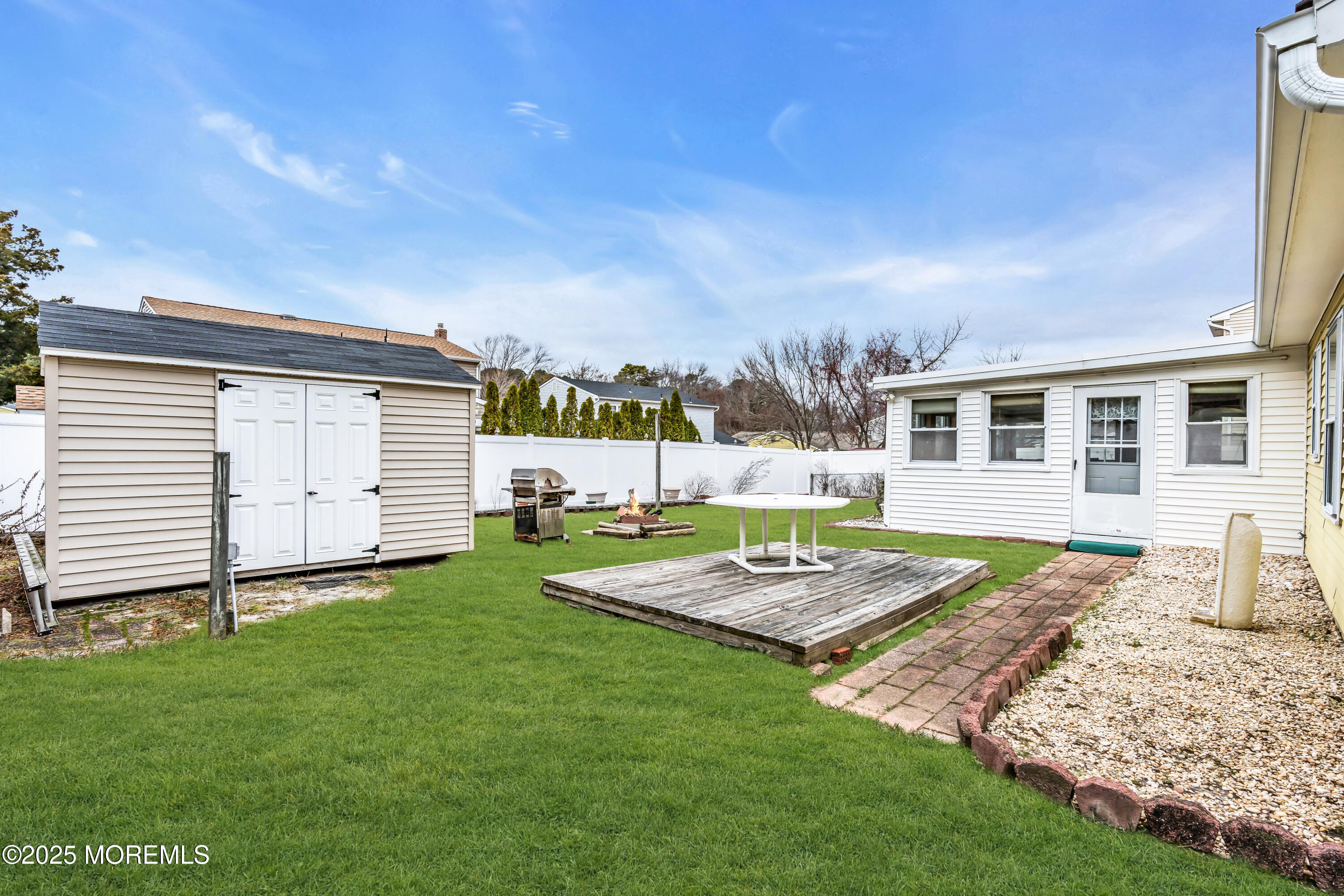 4 Evergreen Place Howell, NJ 07731 - Photo 26 of 27 a view of a house with backyard
