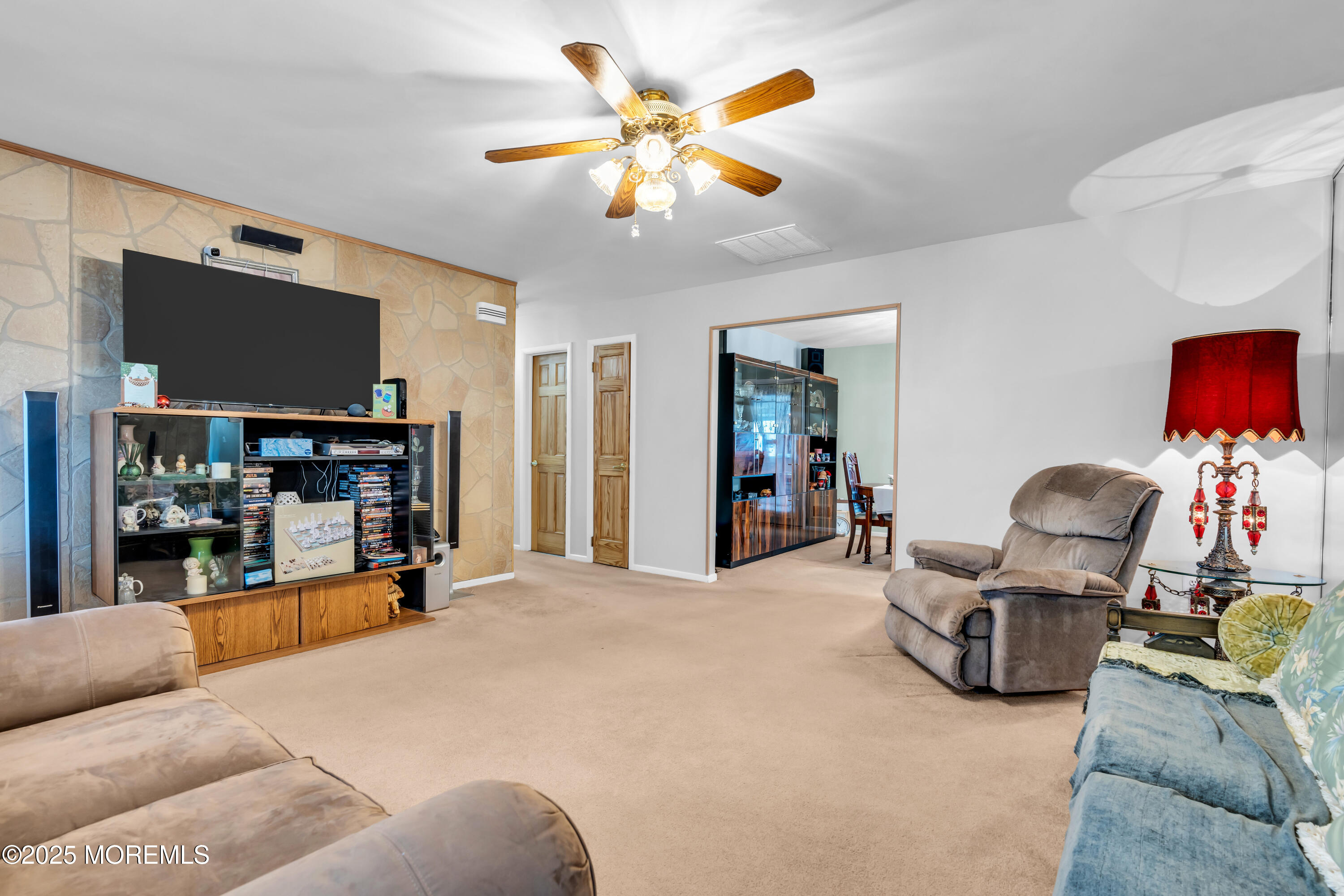 4 Evergreen Place Howell, NJ 07731 - Photo 7 of 27 a bedroom with furniture and a flat screen tv