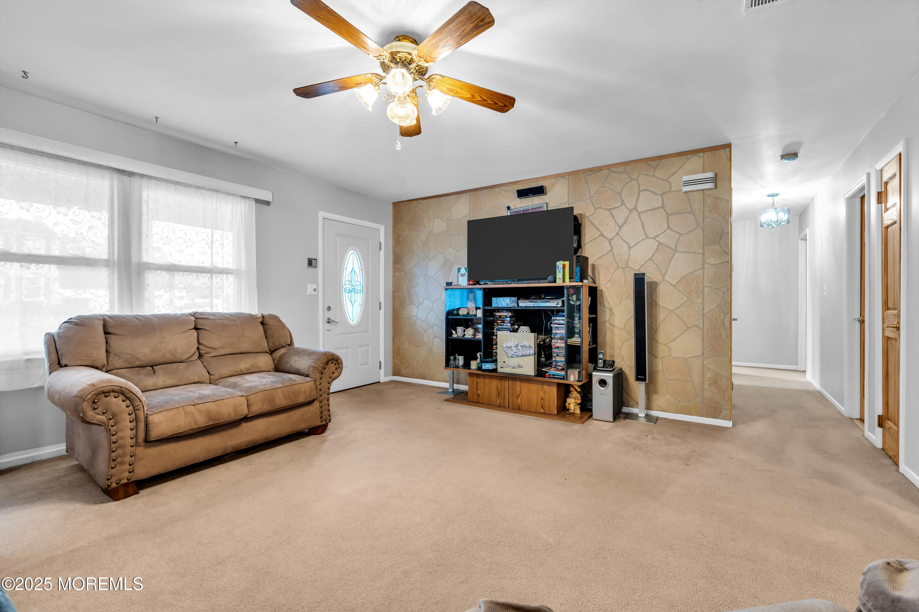 4 Evergreen Place Howell, NJ 07731 - Photo 8 of 27 a living room with furniture and a flat screen tv