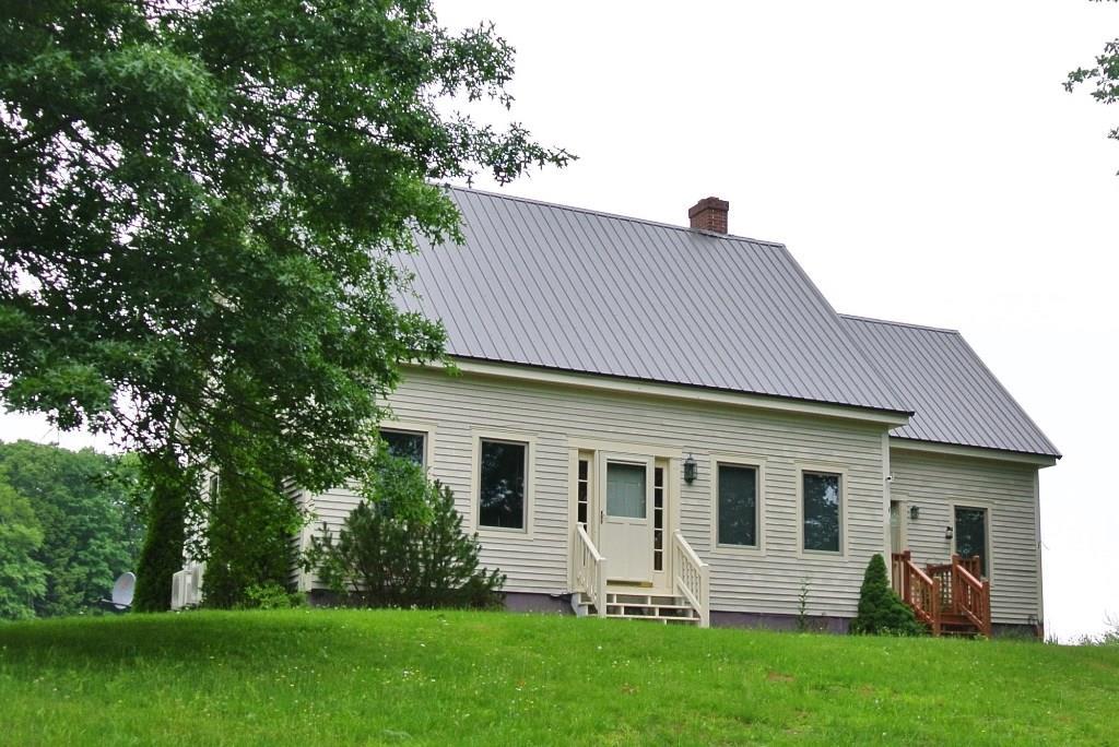 527 Wingood Road Windsor, ME 04363 - Photo 2 of 33 Front of the Home... new metal roof...