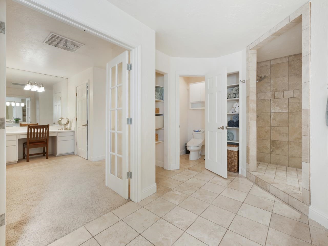 2433 H Road Grand Junction, CO 81505 - Photo 24 of 42 a view of a bathroom with a shower and a sink