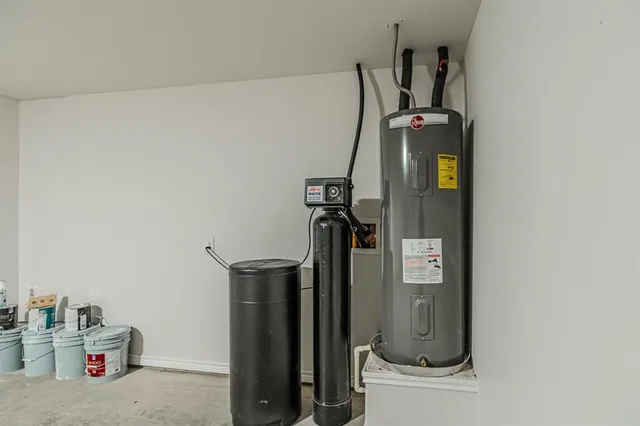 a view of storage and utility room with utility room