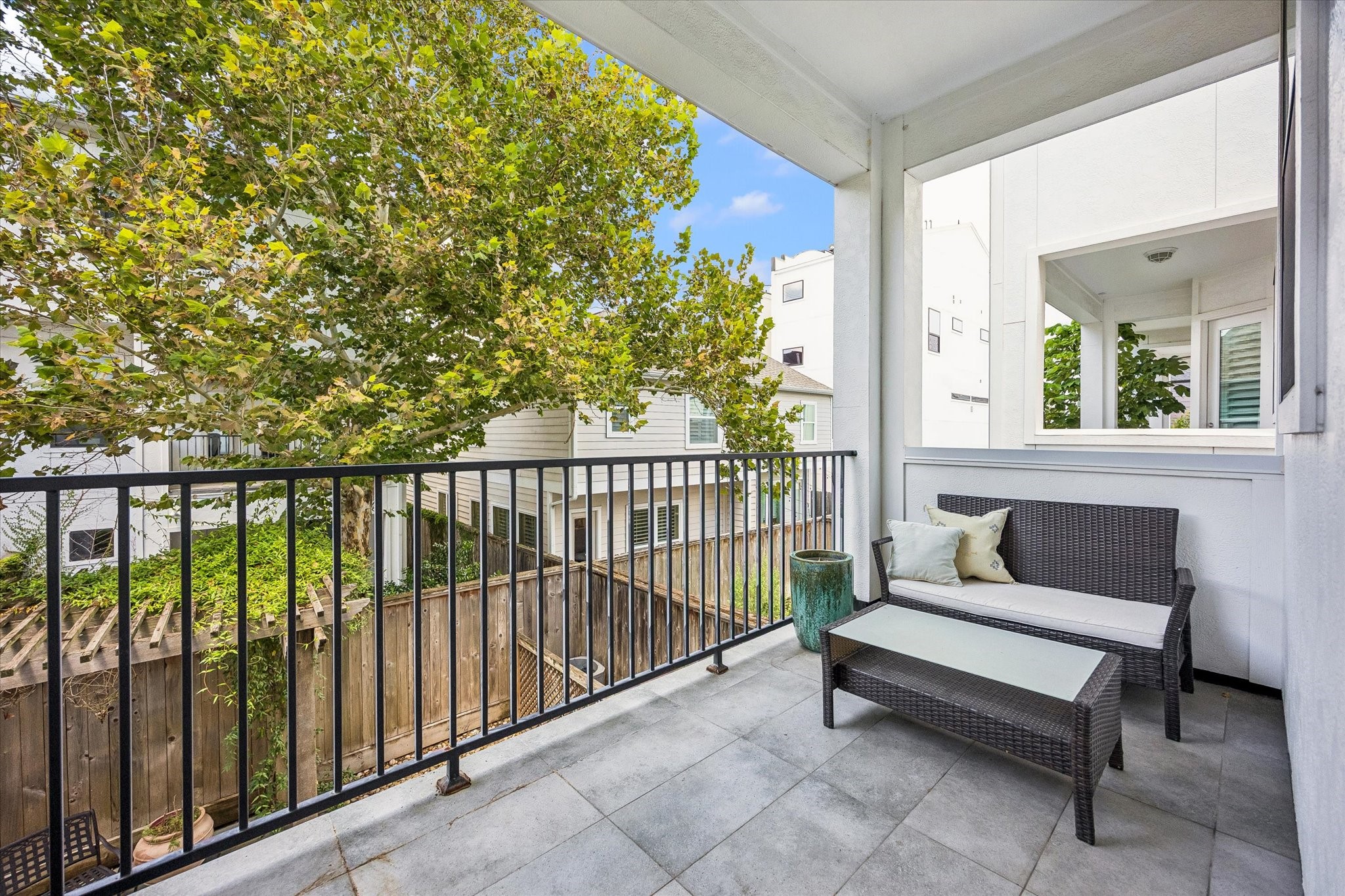 1810 Ridgewood Street Houston, TX 77006 - Photo 13 of 30 The second balcony is located off the den and kitchen, overlooking the backyard with treetop views.
