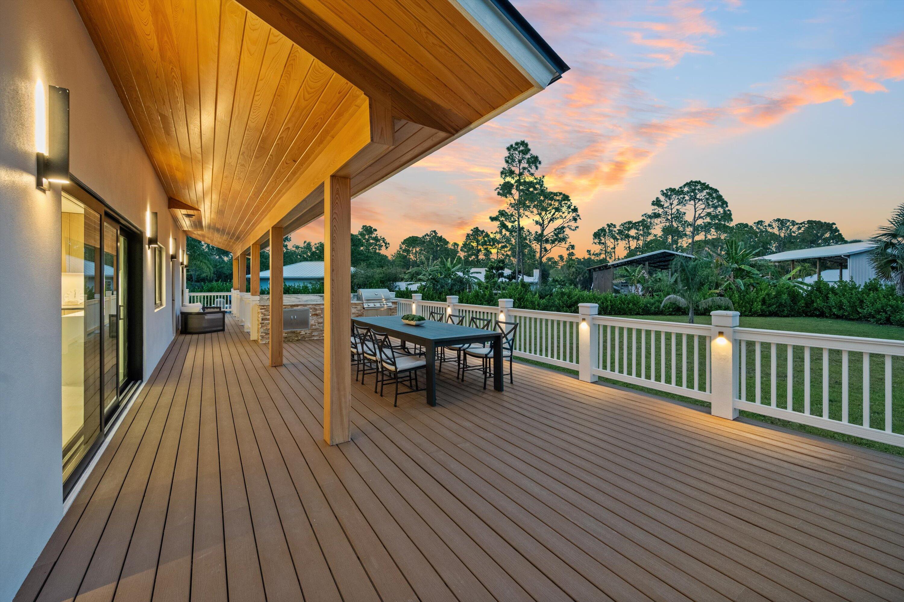 13613 157th Court North Jupiter, FL 33478 - Photo 31 of 54 a view of a chairs on the roof deck