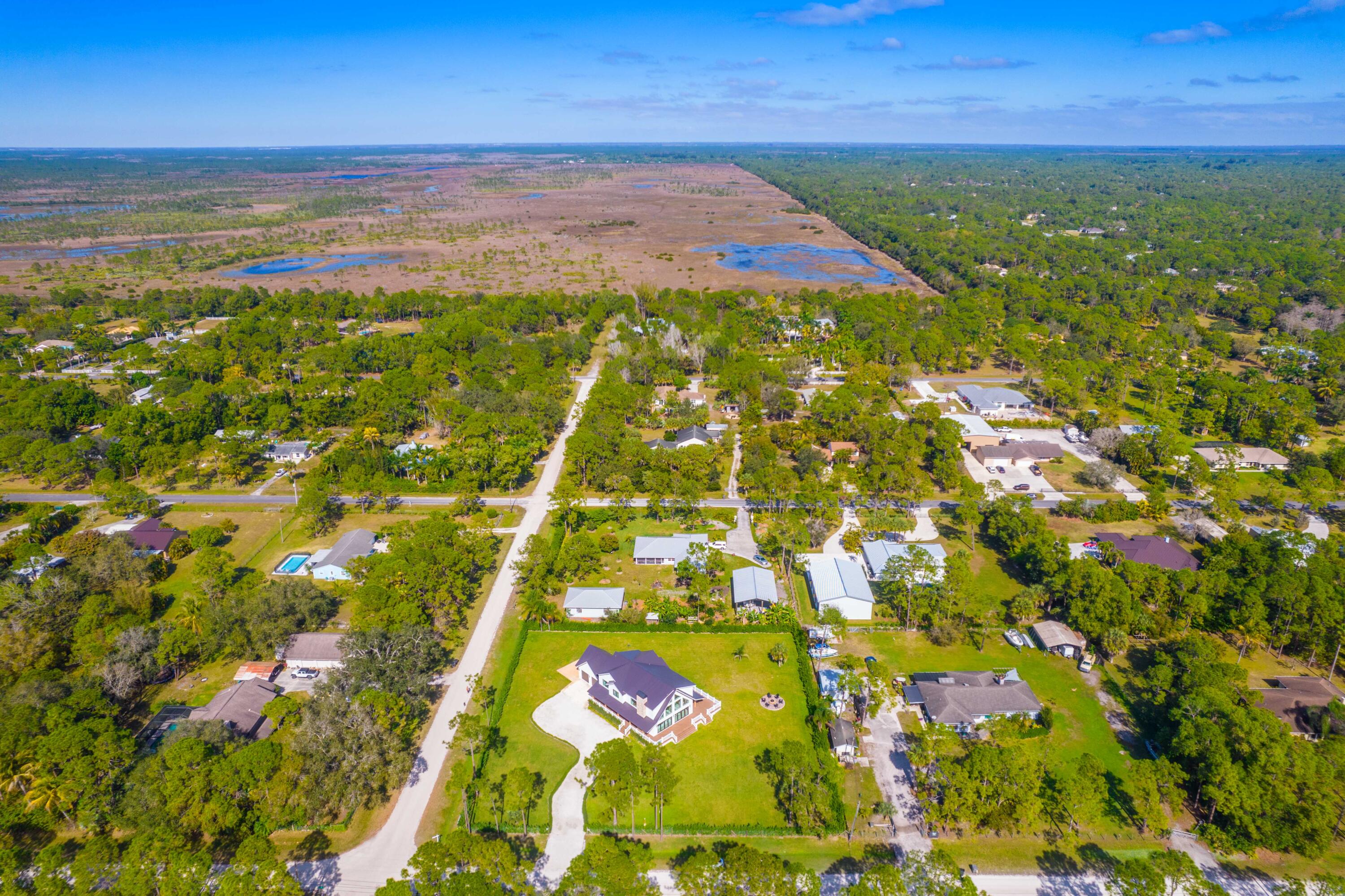 13613 157th Court North Jupiter, FL 33478 - Photo 39 of 54 a view of an outdoor space and mountain view