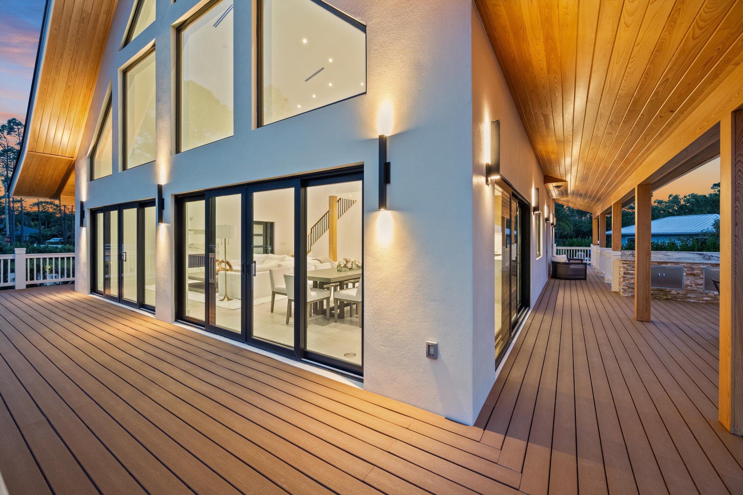 13613 157th Court North Jupiter, FL 33478 - Photo 47 of 54 a view of a house with a porch