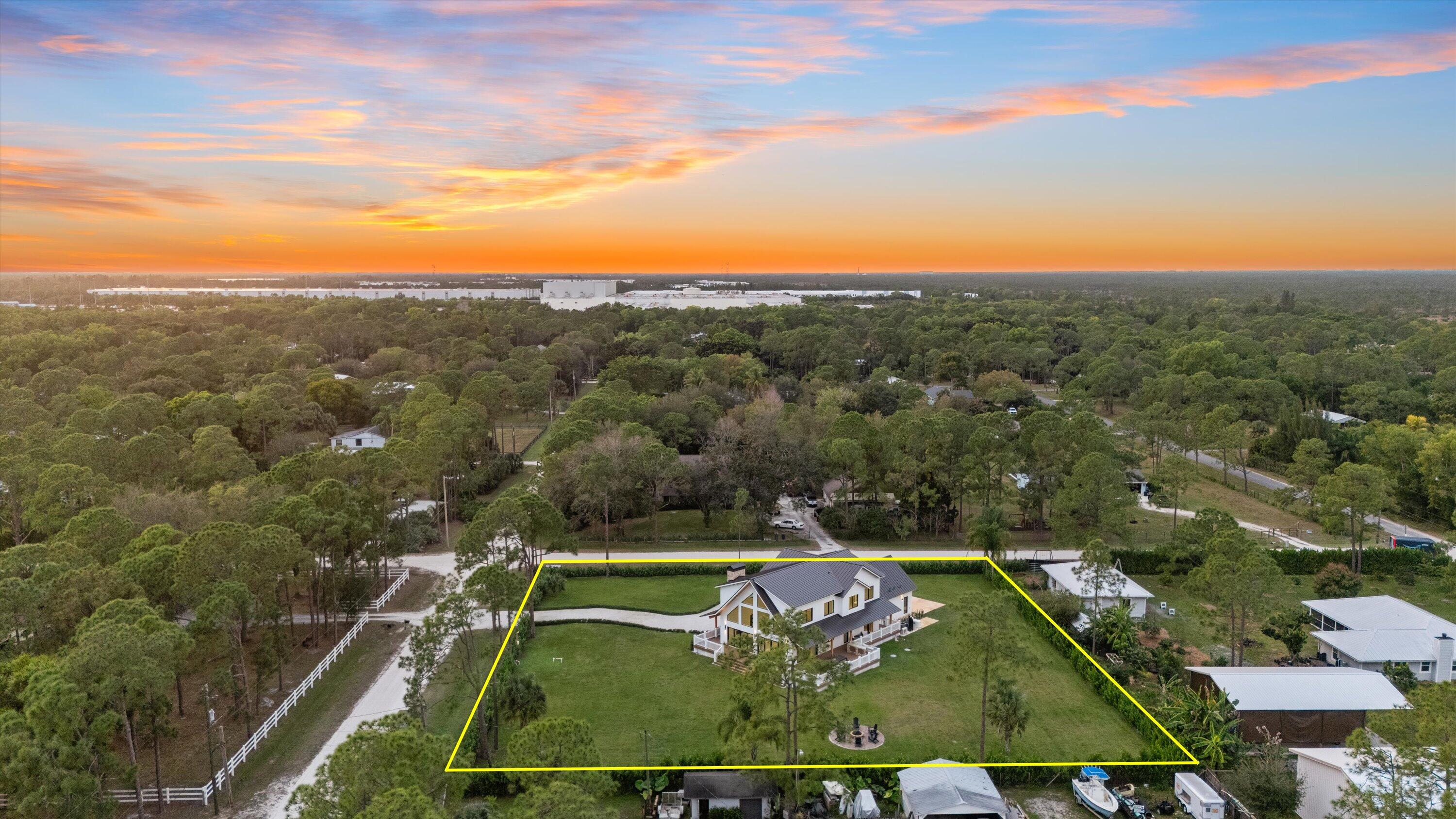 13613 157th Court North Jupiter, FL 33478 - Photo 52 of 54 a view of a tennis court