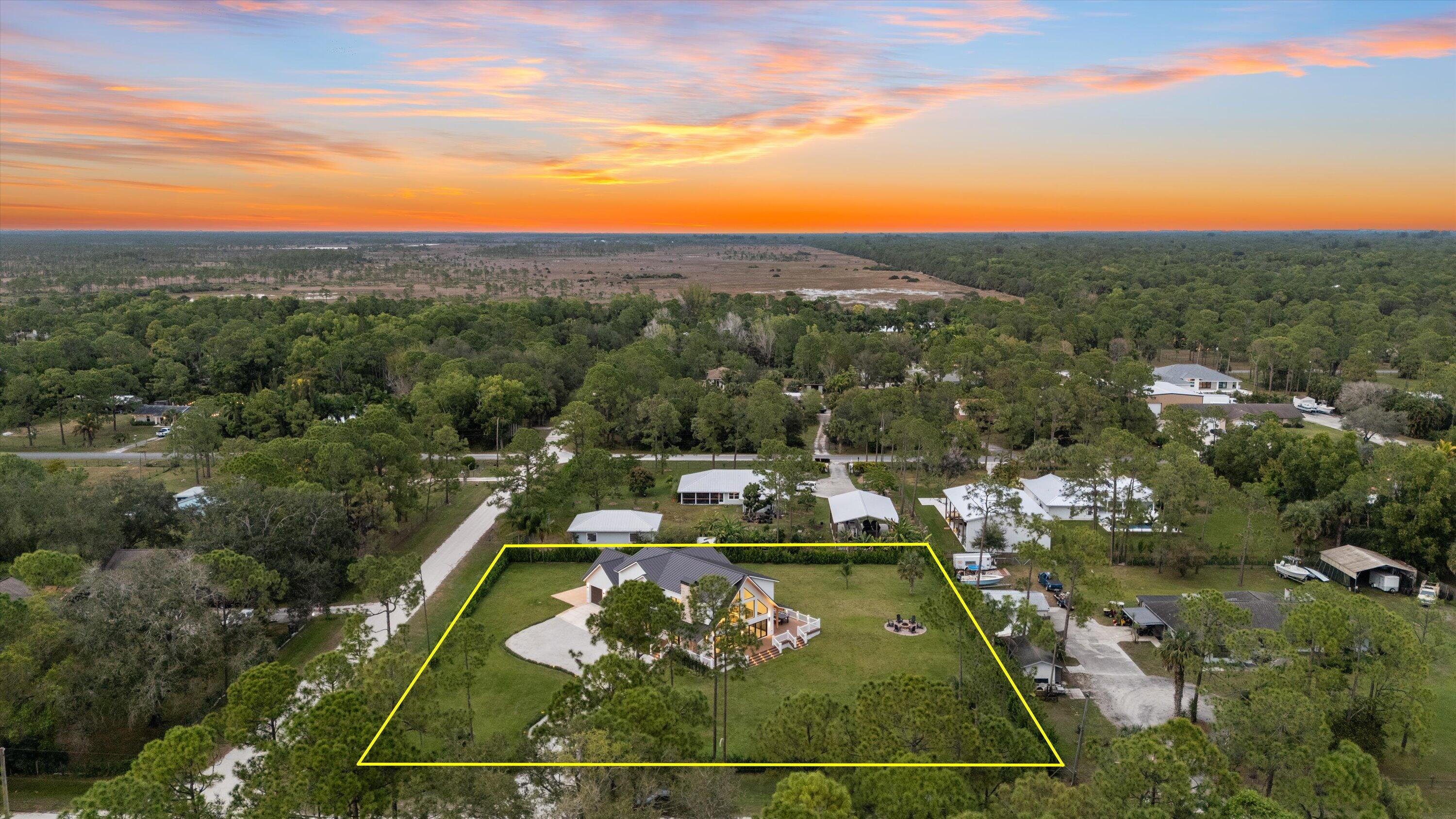 13613 157th Court North Jupiter, FL 33478 - Photo 54 of 54 view of a tennis court