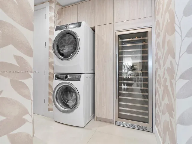a utility room with washer and dryer