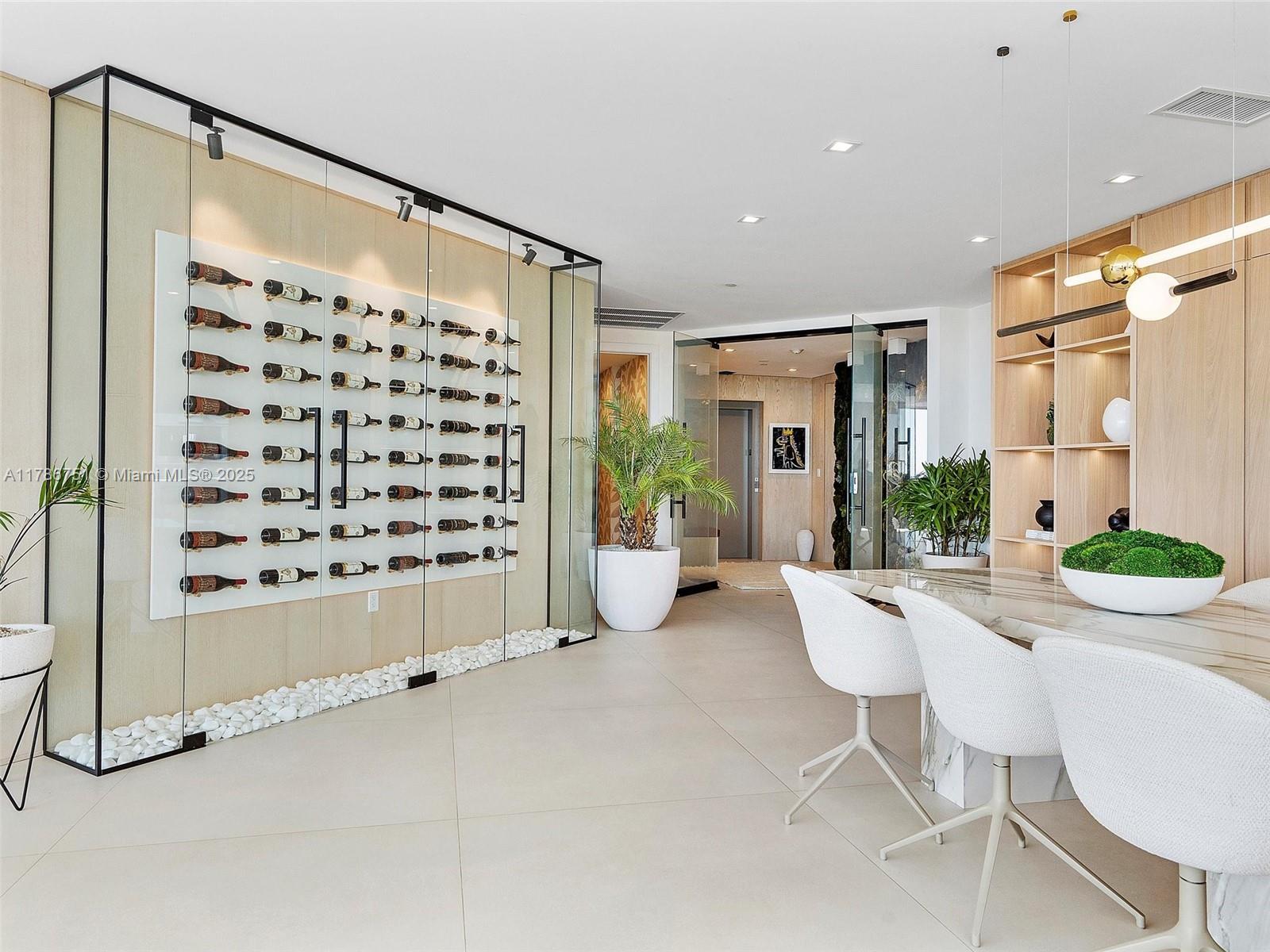 21 Isle Of Venice Drive, Unit PH1 Fort Lauderdale, FL 33301 - Photo 6 of 20 a living room with furniture and a large window