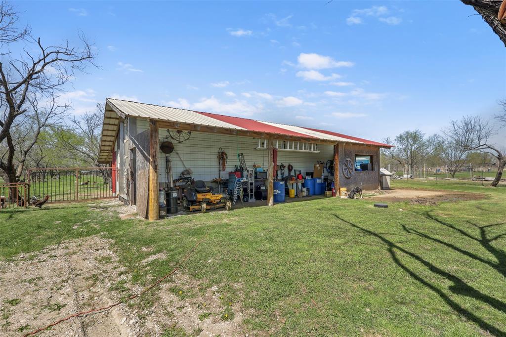 1556 John Wayne Road Kaufman, TX 75142 - Photo 20 of 33 a view of a house with a backyard