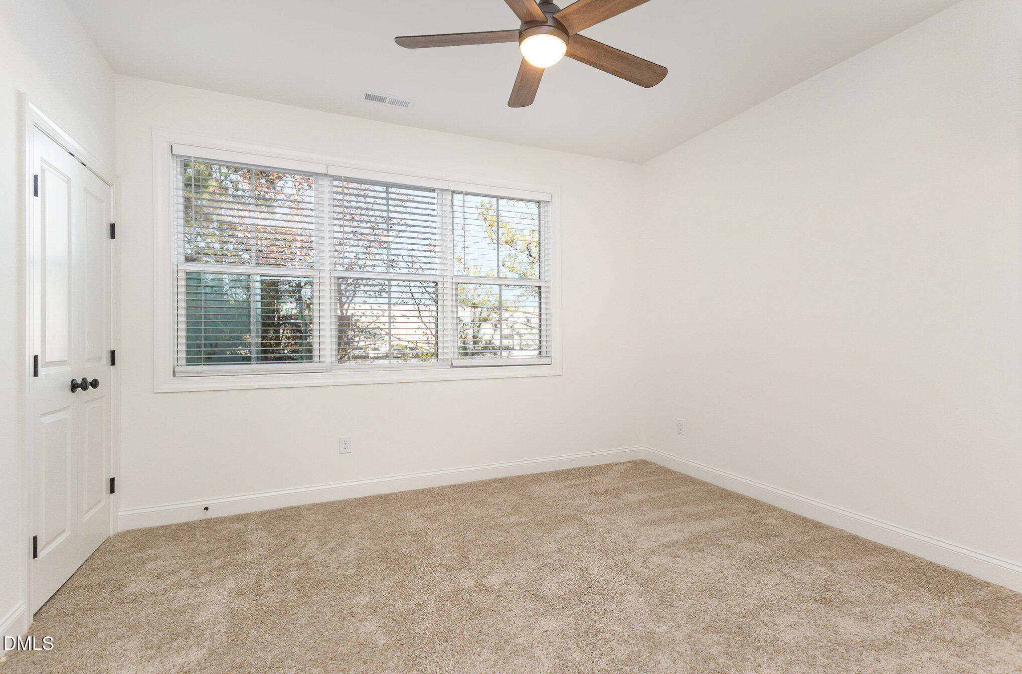 4801 Gossamer Lane, Unit 106 Raleigh, NC 27616 - Photo 16 of 42 an empty room with a window