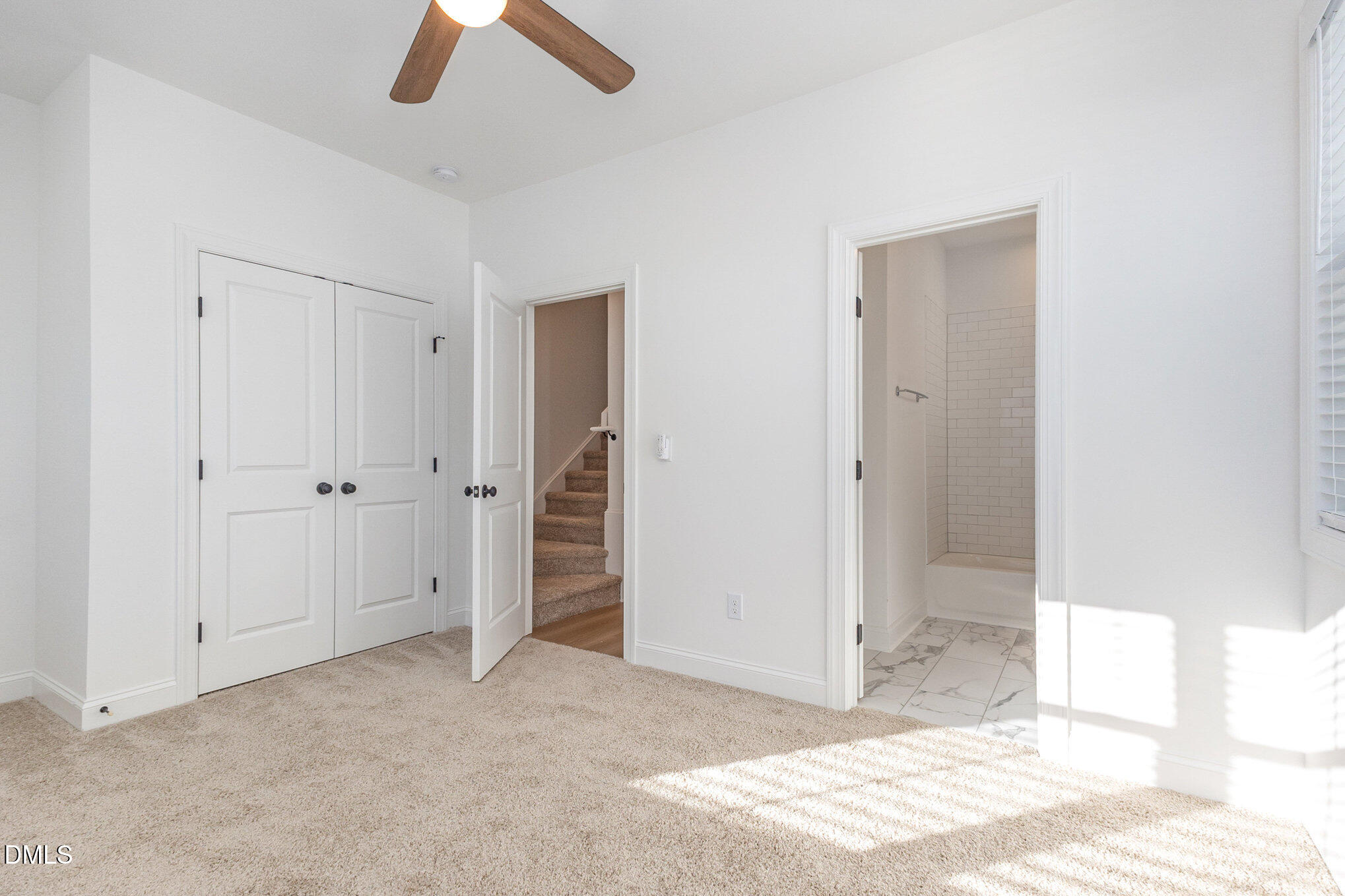 4801 Gossamer Lane, Unit 106 Raleigh, NC 27616 - Photo 23 of 42 a view of empty room with ceiling fan