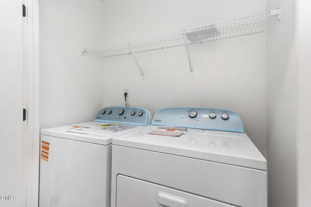 a view of empty room with ceiling fan
