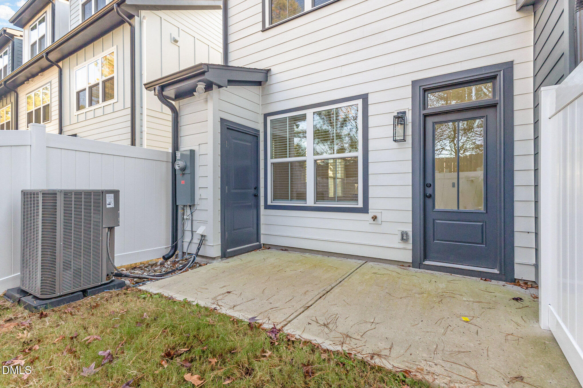 4801 Gossamer Lane, Unit 106 Raleigh, NC 27616 - Photo 36 of 42 a view of a house with backyard and wooden fence