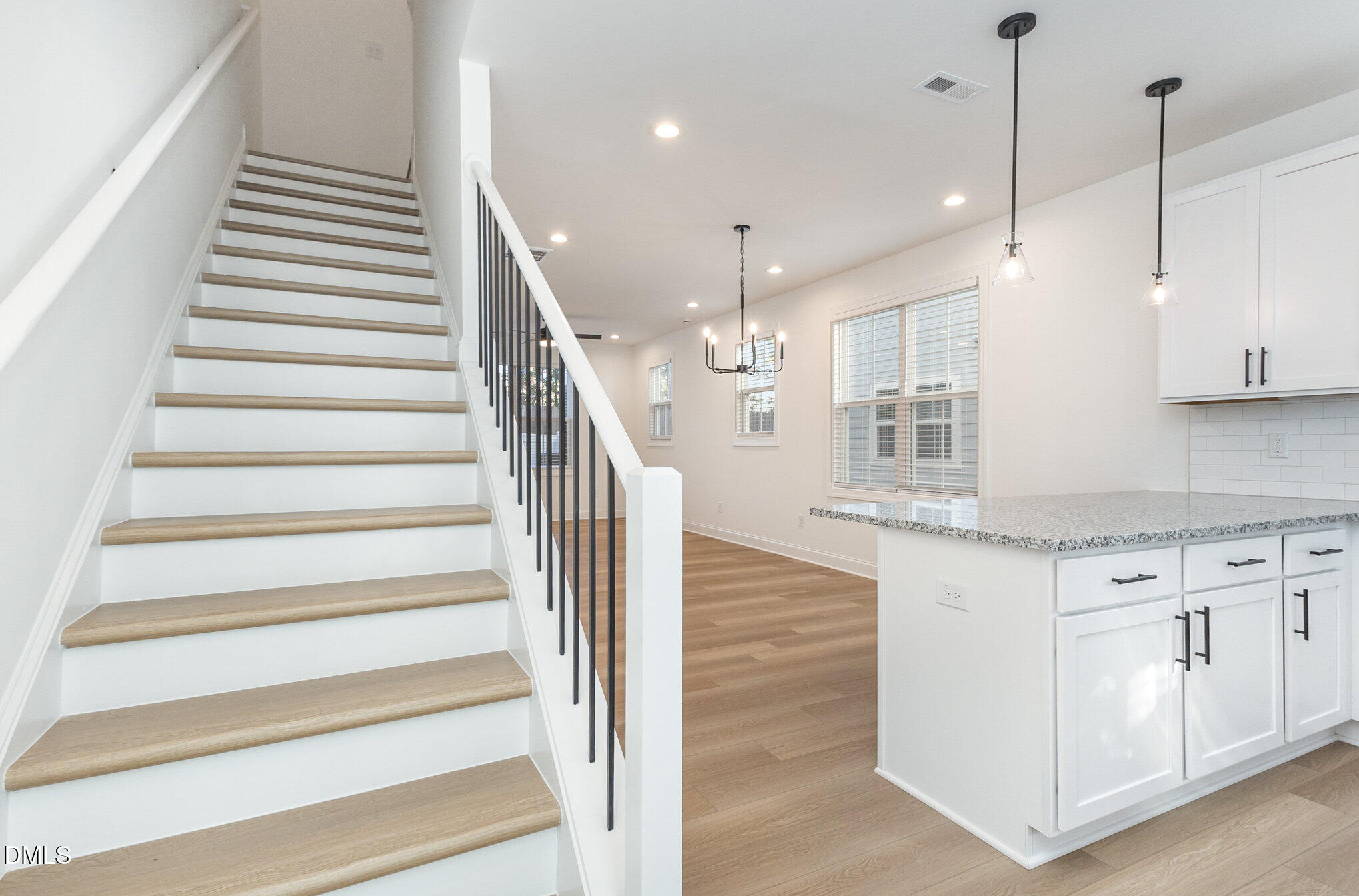 4801 Gossamer Lane, Unit 106 Raleigh, NC 27616 - Photo 4 of 42 a view of entryway and hall with wooden floor