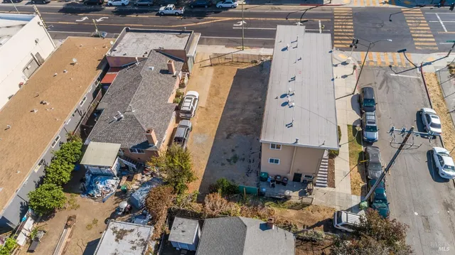 an aerial view of a house with outdoor space